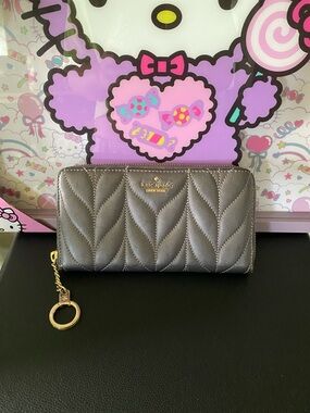 kate spade Quilted Chevron Zip Wallet in Metallic Silver